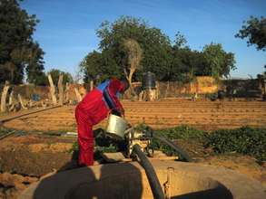 Tagantassou School Director working in garden