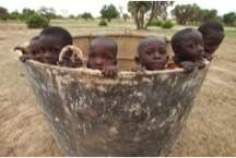 Boys play in the well mold