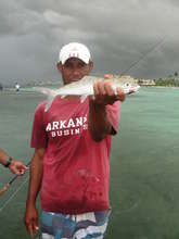 training local fishermen in fly fishing technique