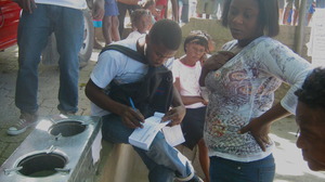 Jean promoting cookstoves in Port-au-Prince