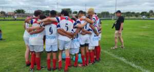 Arca rugby players strategizing before the game!