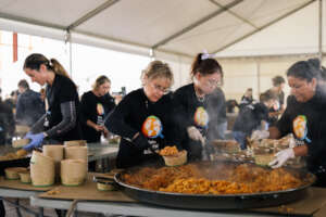 Serving paella in Spain, a staple in the region