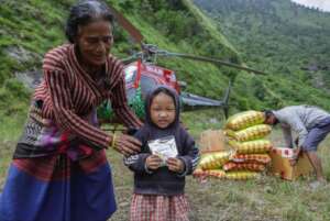 A girl shows off her brownie in Nepal