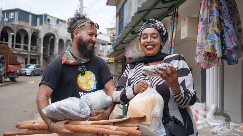 Chef Fatima helping WCK navigate a Mahoran market