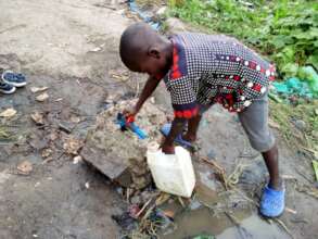 Student collecting water