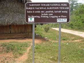 Park sign in English and Q'eqchi' Maya