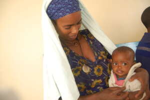Selam before surgery with her mother.