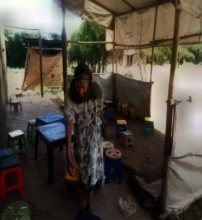 Biftu at her coffee stand.