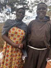 A widow beneficiary of land rights with Director