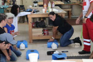 Students learning to help with CPR