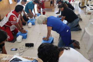 Students learning to help with CPR