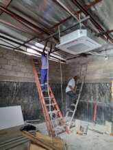 Constructing Dropped Ceilings Over Lead Panels