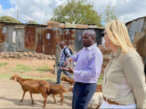 project leader Mr.Job  taking guests around slums