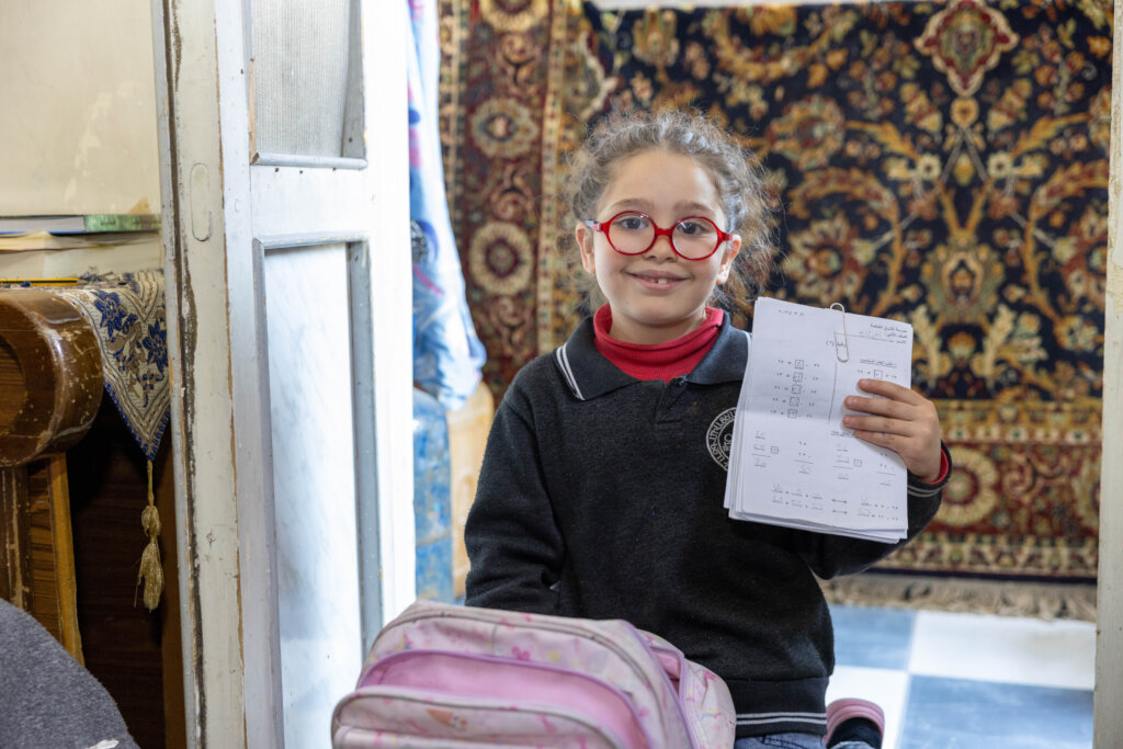 Maria, a happy and proud student