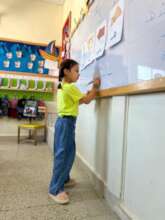 a girl at school in Aleppo