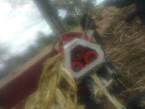 Sugar cane harvester