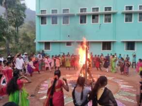 School kids dance around Bhogi fire at Sankranti