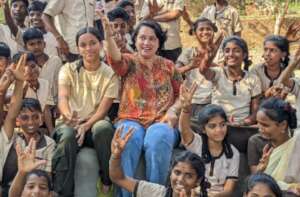 Mrs. Lalitha with school students