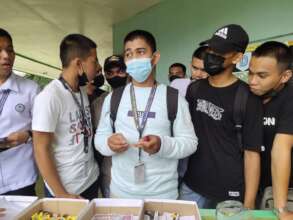 Psychology students setting up materials