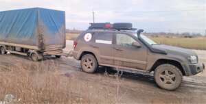 Krystoff's car and aid on the road