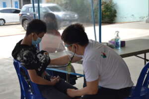 MedAcross doctor visiting a migrant worker