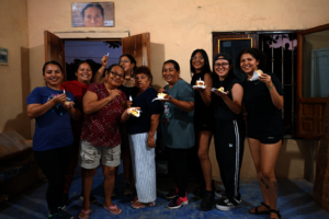 Women sharing Rosca de Reyes
