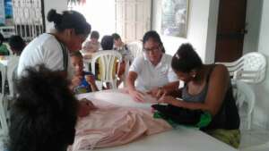 Volunteers, one of them, mother head of household