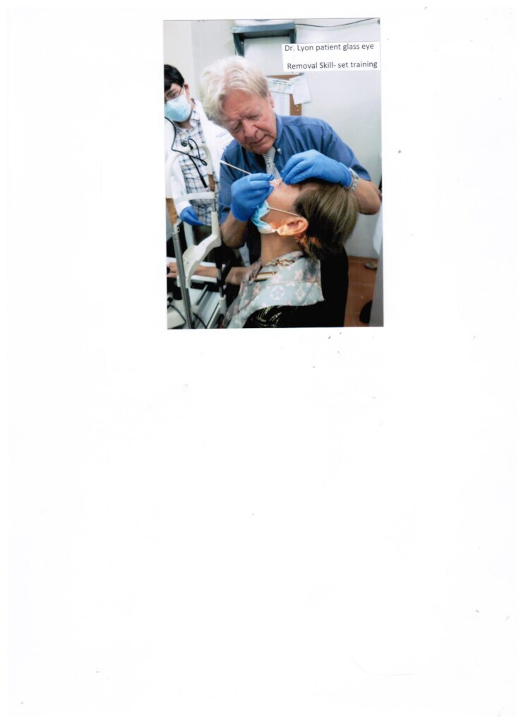 Dr Lyon teaching eye residents patient care
