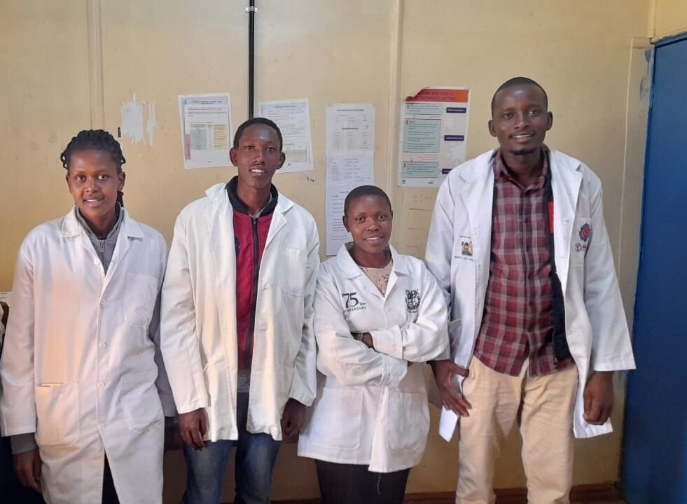 Nellius Aitong with colleagues