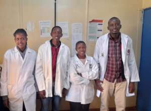 Nellius Aitong with colleagues