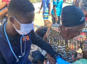 Doctor performing medical assessment.