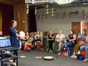 Teachers Learn to Play Drums!