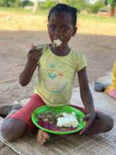 Preschool student enjoying lunch!
