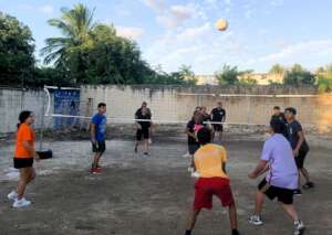 Teens playing Volleyball