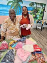 Preparing knitting item packages to donate