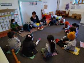 Ruth with her students in class