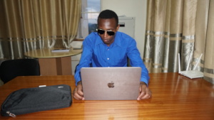 A blind law student using a Macbook laptop.