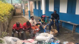 Staff Members Constructing Ecobricks