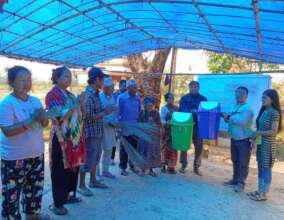 Handover of dustbin and brooms