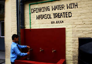 Kamal Filling His Water Bottle