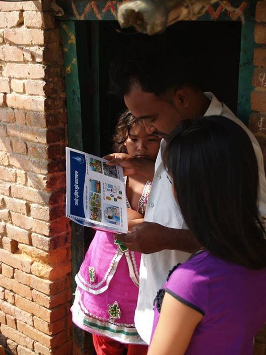 A house owner going through a flip chart