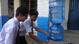 Students using chlorinate water in School