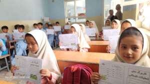 Second graders with their midterm exam result