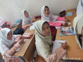 Third graders, in Herat province, loving school.