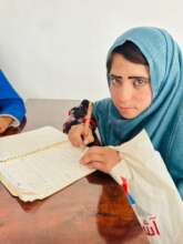 Marzia, attending first grade in Ghore province