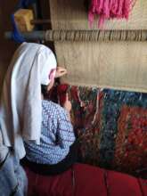 Mahnaz weaving carpet