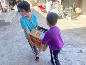 Kids helping to deliver