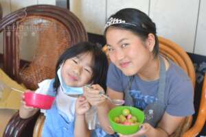 Kids teaching kids & sharing meals in our workshop