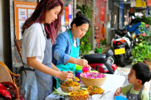 Serving meals to kids who created the meal togethe