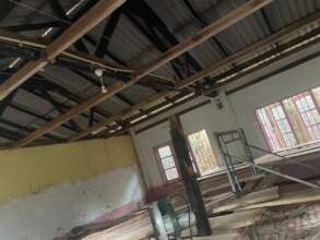 The rotten roof beams were replaced